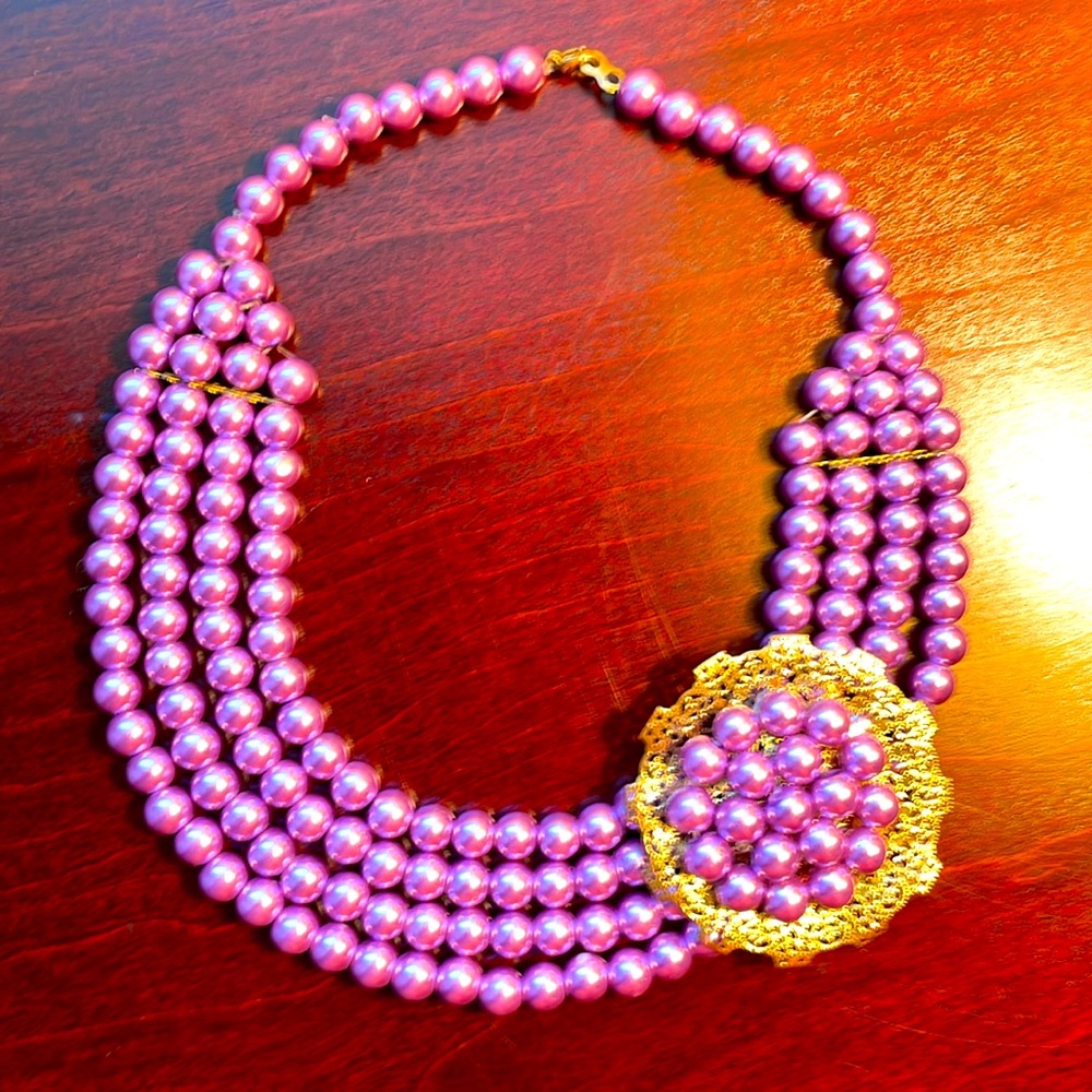 Women’s purple necklace handmade for a Nigerian wedding. Goldtone clasp to side